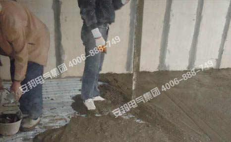 電地暖鋪設完成后的混凝土回填